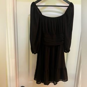 Black tie back, flowy dress, only worn a few times, really comfortable and cute
